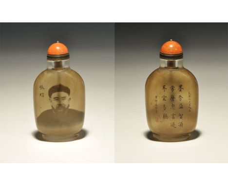 20th century AD. A glass snuff bottle with sepia portrait and blocks of calligraphic text; supplied in a silk-lined case. 111