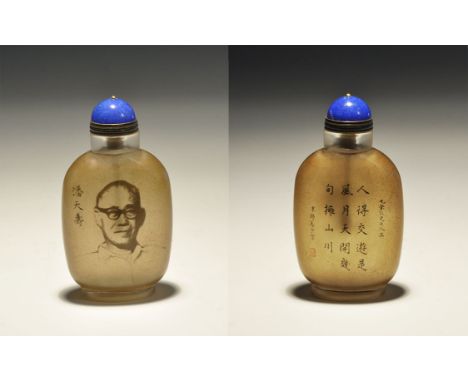 20th century AD. A glass snuff bottle with sepia portrait and blocks of calligraphic text; supplied in a silk-lined case. 111