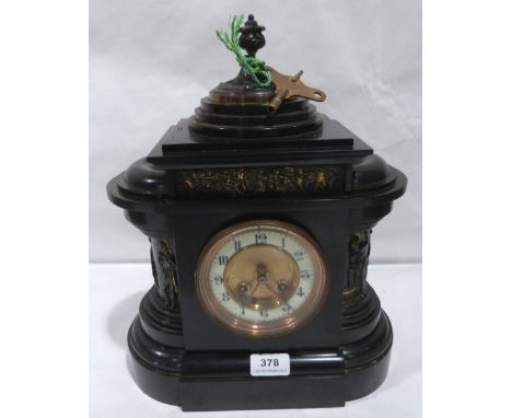 A French slate mantle clock of architectural form, the two train brass drum movement striking on a coiled gong. 14½' high