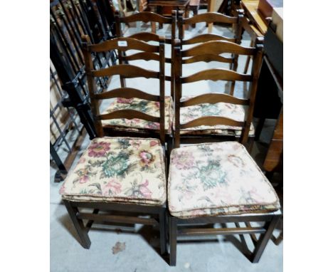 A set of Ercol dining chairs with ladder backs 