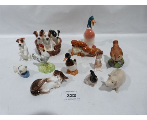 A collection of ceramic animals, Royal Doulton and other factories