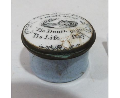 A George III Staffordshire enamel patch box, the lid with verse and depiction of country house, the interior with a mirror. E