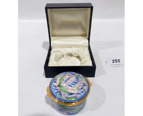 A boxed Moorcroft enamel pill box 