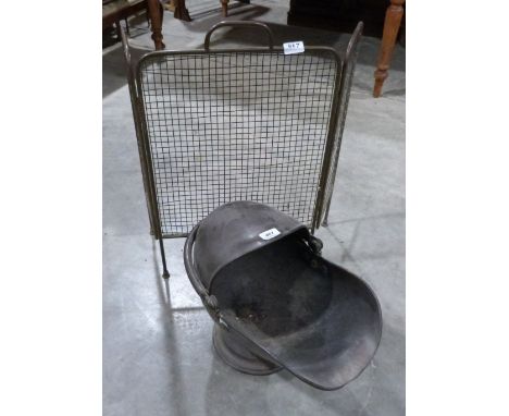 A copper coal scuttle and a triptych fireguard