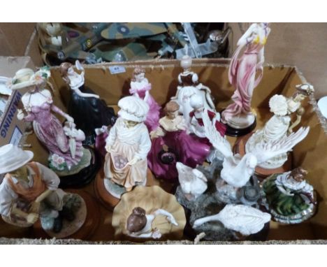 A box of ceramic figures