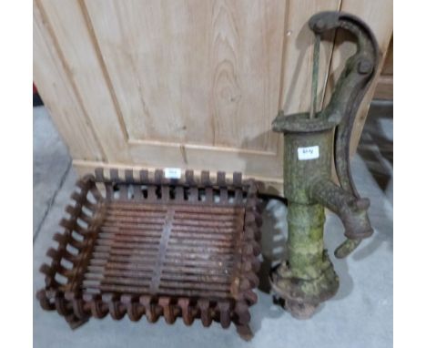 A cast iron fire grate and an iron pump