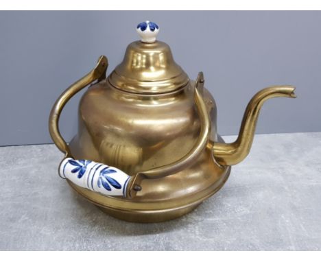 Large vintage brass kettle with ceramic handles