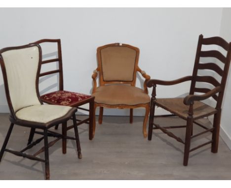 Four mixed chairs includes oak framed ladder back armchair a leather seated metal backed studded chair along with mahogany fr