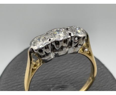 Ladies 18ct gold 3 stone diamond ring. Approx .33ct 2.8g size K1/2