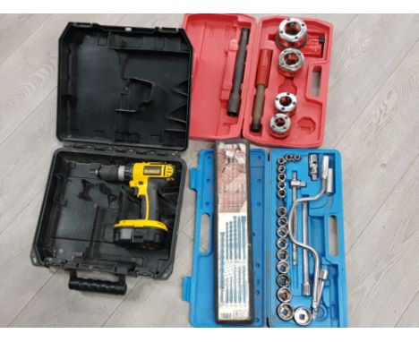 Mixed tool lot includes kinzo ratchet set, screwbits and Dewalt battery powered drill (needs charger) all in protective hardc
