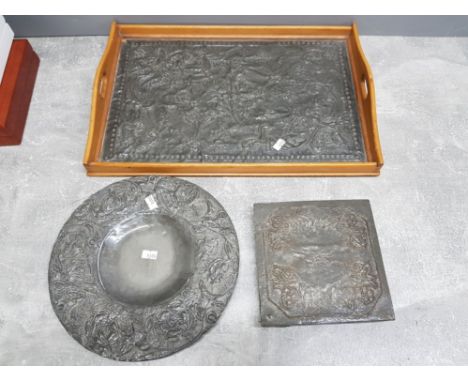 Art nouveau wood serving tray with figured tin overlay together with carved pewter wall plate and teapot stand