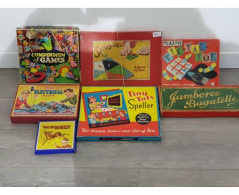 Vintage boardgames seven in total including spring rings,tic-tac toe ,jamboree BAGATELLE  etc