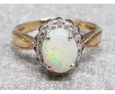 9ct opal and diamond cluster ring, size P, 2.9g