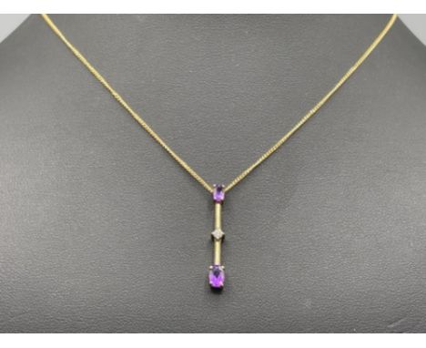 9ct gold Amethyst and diamond pendant and chain.