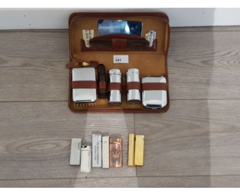 Mens vanity box Wilkinson sword in a leather case along with seven cigarette lighters