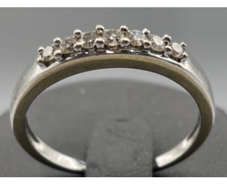 Ladies 18ct white gold 7 stone diamond ring 2.8g size O1/2