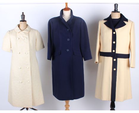 A collection of ladies costume, including: a Peggy Goss navy blue coat, an Aquascutum camel wool skirt, a Peggy Goss navy and