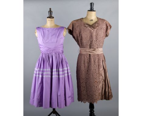 A 1950s navy blue spotted dress, a late 1950s mauve sleeveless summer cotton dress, a pink satin blouse, a 1960s brown lace d