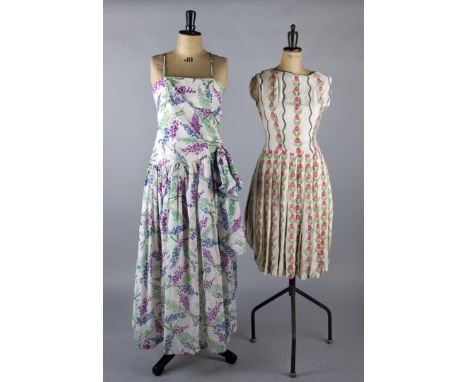 An early 1950s full-length floral evening gown, a late 1950s yellow and brown silk dress with matching jacket, a pale silk bl