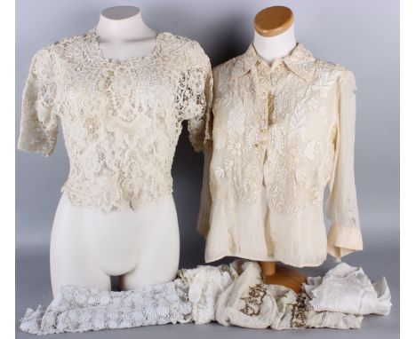 A collection of late 19th/early 20th century lace and cotton blouses, including: an early 20th century fine lace blouse, a Br
