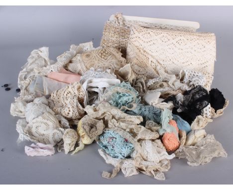 A collection of dress-making and light upholstery weight textiles, trimmings and miscellaneous sewing items.