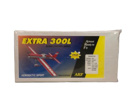 Radio controlled plane. Scale ARTF model by VMAR Extra 300L for 10cm motor or equivalent. Appears new as sealed, 153cm wingsp