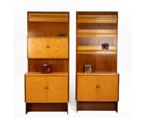Two mid-century tall cabinets, c1960's. Burr maple and walnut. Different drawer and shelf configuration to each. Each stands 