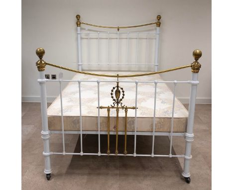 Victorian enamelled brass 4ft double bed. Brass details, base on ceramic castors. Width of frame 139cm, length 207cm, height 