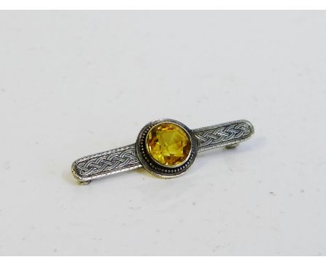 Scottish silver and citrine brooch with Celtic knotwork pattern, 5cm wide 