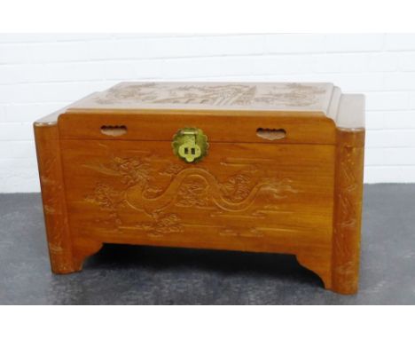 An Oriental  carved wood storage trunk, 48 x 90cm 
