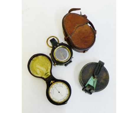WWI compass dated 1916, with leather outer case, a J. Hicks compass and a gilt cased pocket barometer (3) 