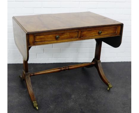 A mahogany sofa table on reeded splayed supports,  72 x 92cm 