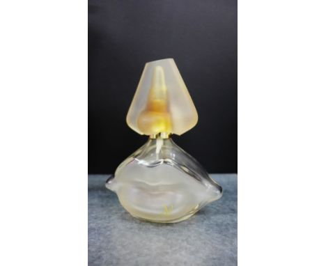 An opaque glass Salvador Dali perfume bottle and lid, 13cm high