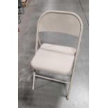 Stack of Foldable Metal Chairs