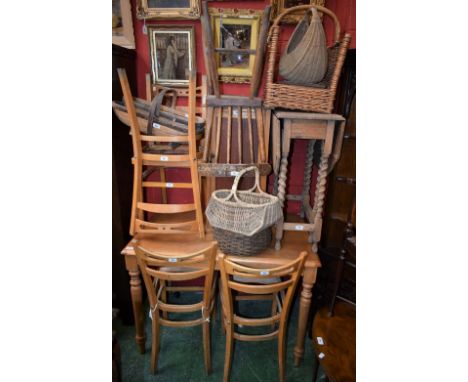 A contemporary light oak dining table; a similar earlier gateleg occasional table; a set of four mid-20th century side chair 