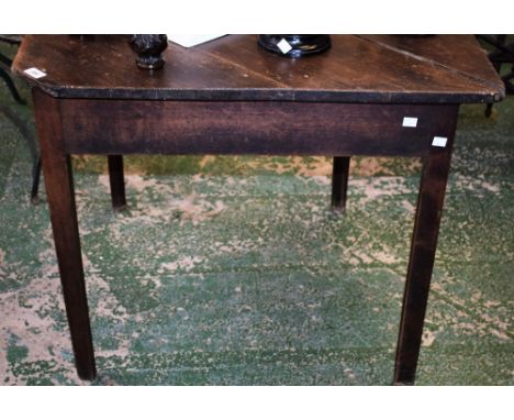 A George III oak credence type table, near square top with diagonally hinged fall leaf, slightly tapered legs, 70cm high