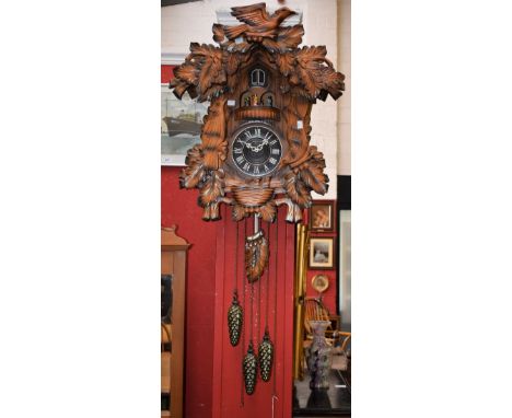 A large Kaiser Quartz cuckoo clock, approximately 66cm high