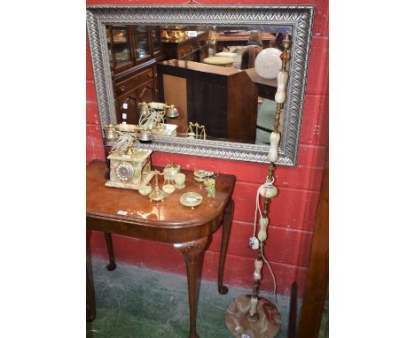 An Italian onyx and brass dial up telephone; a standard lamp, cigarette lighter etc; a wall mirror