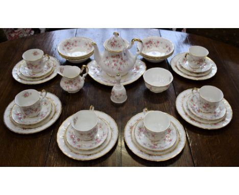 A Paragon Victoriana Rose pattern tea and dessert service, for six, comprising teapot, cups, saucers, side plates, milk jug, 