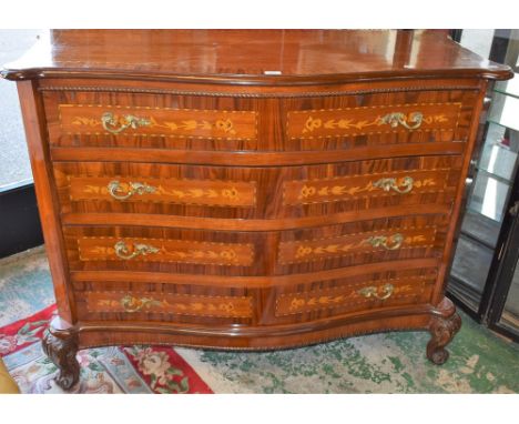 A large Louis XV style gilt metal mounted commode