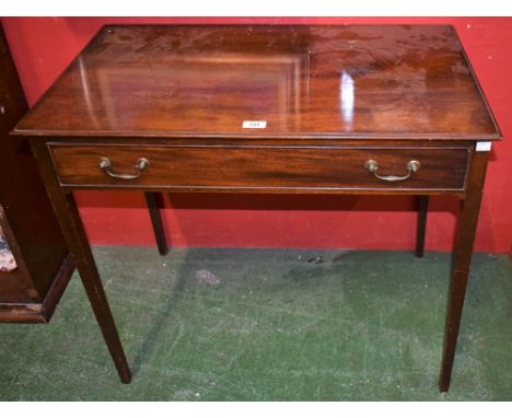 A George III mahogany rectangular side table, moulded top above a cockbeaded frieze drawer, brass swan neck handles, tapered 