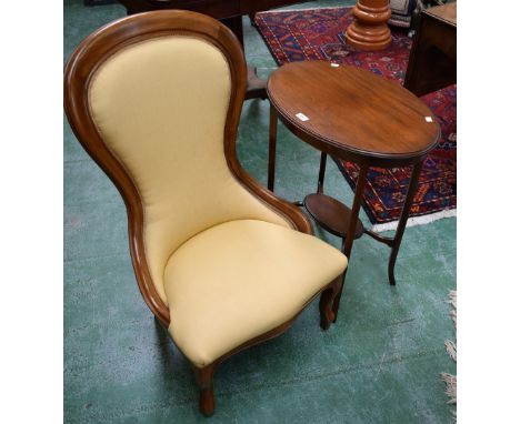 A contemporary Victorian style spoonback nursing chair; an Edwardian mahogany occasional table (2)