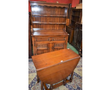 A 20th century oak dresser; a similar gateleg dining table (2)