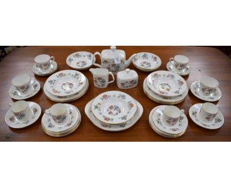 A Royal Doulton Madrigal pattern part dinner service, comprising seven salad plates; four dishes; eight side plates; six sauc