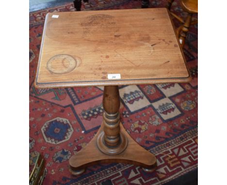 A William IV mahogany occasional table, moulded rectangular top, turned column, incurved triangular base, shallow bun feet, 7