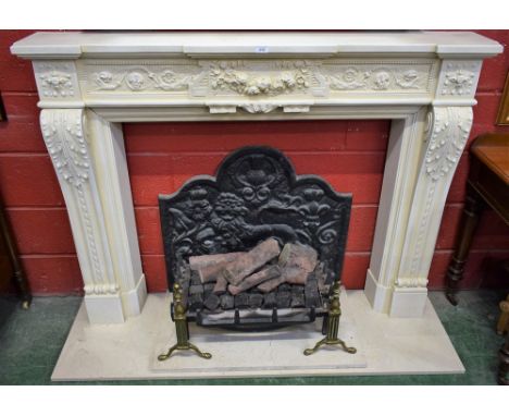 An Elgin and Hall Regency style chimney piece, stepped mantel shelf, the centre tablet moulded with a ribbon-tied swag of sum