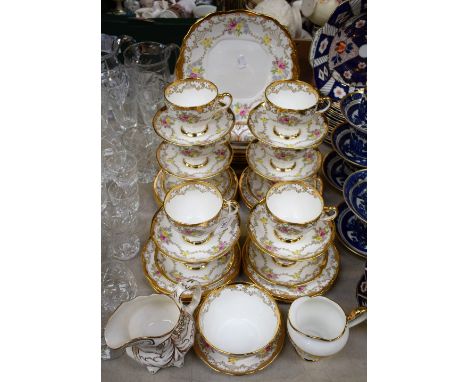 Ceramics - a 'Chelsea' Salisbury China tea service, decorated with floral swags picked out in gilt, on a white ground, includ