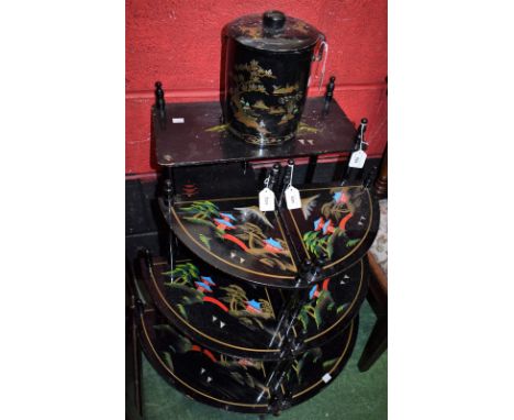 Two Oriental black lacquer tiered corner tables; another, mulit-tier shelf; a similar biscuit barrel; a pair of Oriental pict