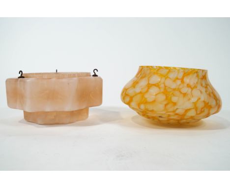 A 1930's pink mottled glass hanging light shade, 29cm diameter, together with a similar orange and white light shade, lacking