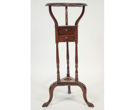 A Georgian mahogany triangular form washstand (some repairs), with a top bowl stand over two shaped drawers on turned baluste